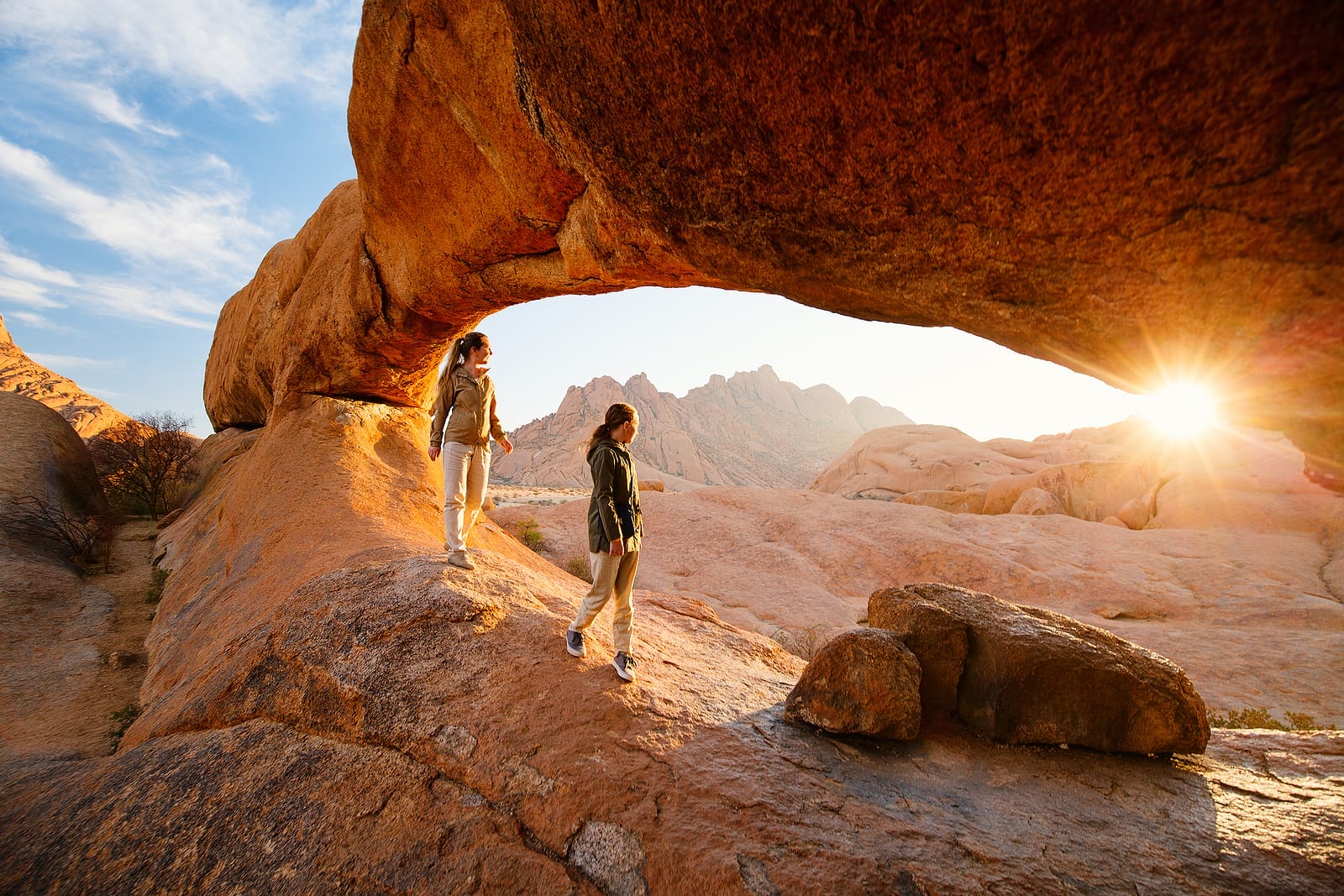 Namibia_Namib_Wueste_Selbstfahrer_Klueger_Reisen enjoying sunrise in Spitzkoppe area w Namibia_Namib_Wueste_Selbstfahrer_Klueger_Reisen